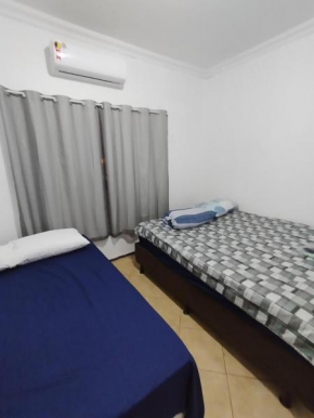 Hotel Indi quarto com banheiro externo
